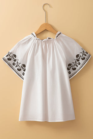 PREORDER: The Ava White & Black Embroidered Sleeves Top 2.24.25 osym